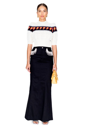 Model styled in the cable knit merino short sleeve cropped knit with lightening bolt detail.