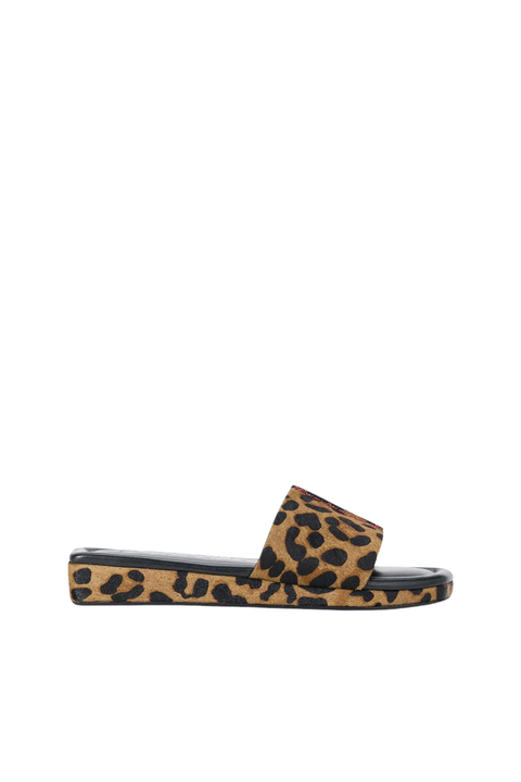 Black sandal with a strap on a white background