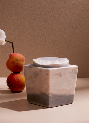 Natural white and grey marble candle with topper.