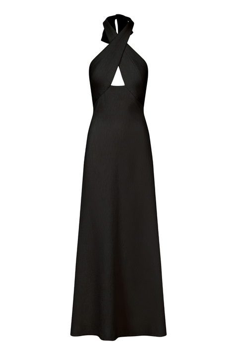 An ankle-length halter-neck black dress on a white background