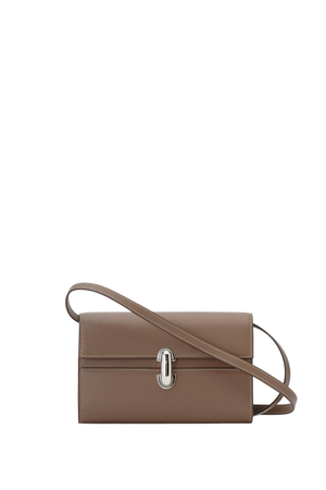 Brown leather handbag with a silver clasp and strap on a white background