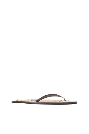 A rattan and leather flip flop shaped like a fish