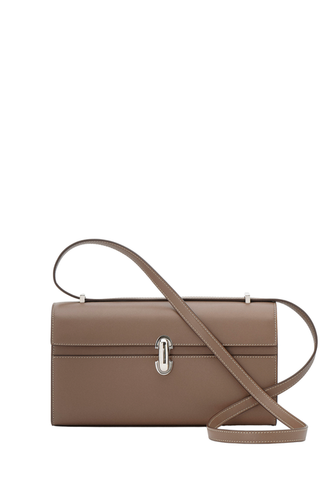 Brown handbag with a strap on a white background