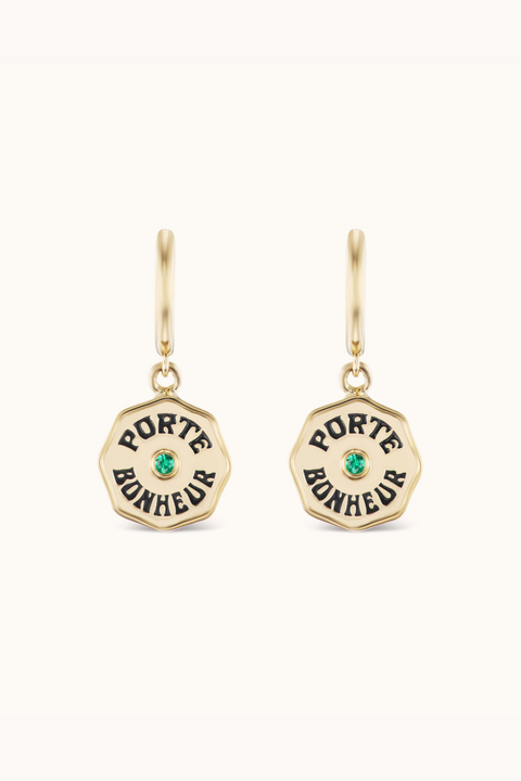 Pair of small coin earrings with 'Porte Bonheur' in black enamel with small emerald at the center.
