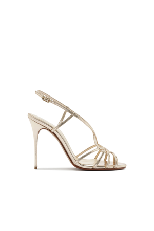 Gold high-heeled sandal on a white background