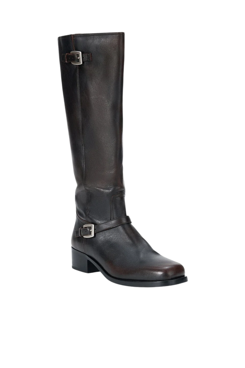 Brown knee-high boot with a buckle on a white background