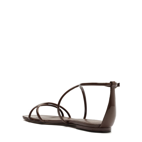 Back side view of strappy patent leather sandal.