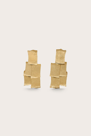 Gold-toned chandelier style statement earrings that feature five layered panels.