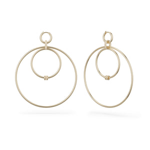 Ghost image of a pair of Spinelli Kilcollin Echo earrings the features a series of different sized yellow gold hoops with yellow gold annulets, some pave with diamonds.