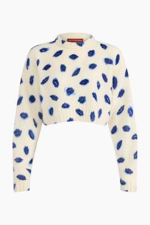 Merion wool blend cropped long sleeve sweater in cream with blue smudged kiss print all over.