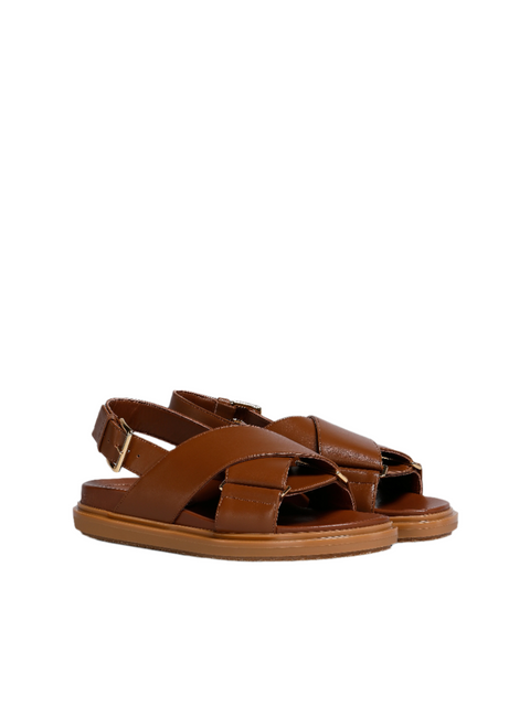 Pair of brown leather sandals with criss cross detail and back adjustable heel strap.