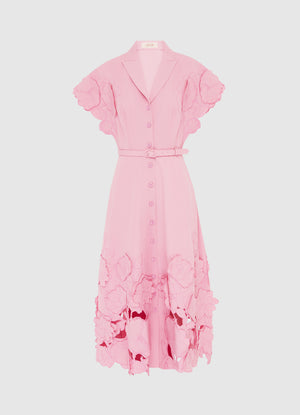Pink short sleeve midi dress with thin belt and floral applique at the hem and sleeve.