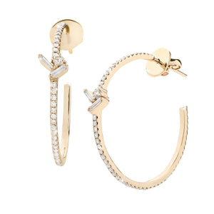 Large yellow gold and diamond hoop earrings with cluster of small multi shape diamonds.