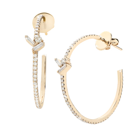 Large yellow gold and diamond hoop earrings with cluster of small multi shape diamonds.