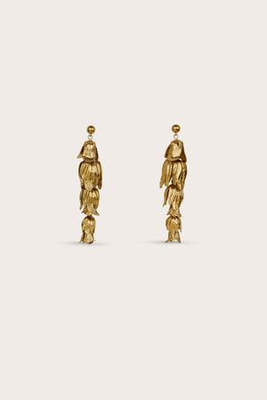 A pair of gold-toned drop earrings that resemble antique brass flowers.