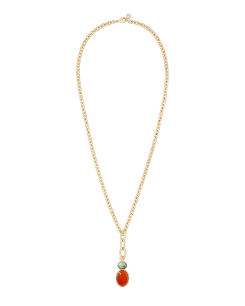 A gold-tone chain necklace that features a semi-precious stone pendant of carnelian and turquoise.