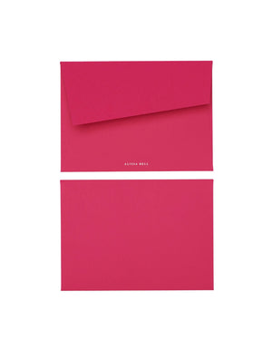 Pink stationary on a white background