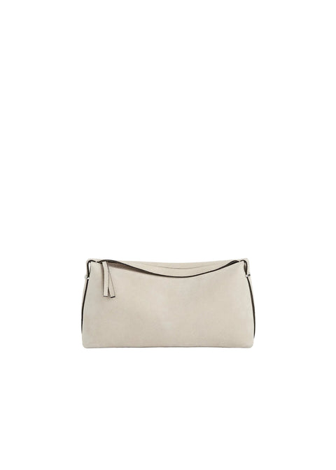 Beige suede handbag on a light beige background