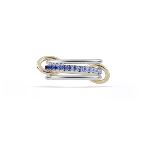 Ghost image of a Spinelli Kilcollin linked ring that features two thin sterling silver rings connected to a sterling silver ring that is paved with ombre light to dark blue sapphires, connected with to 18k yellow gold connector rings.