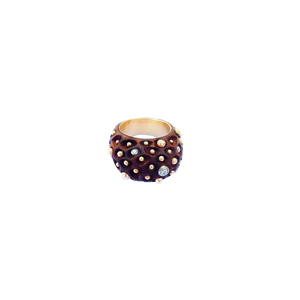 Ghost image of the carved walnut wood ring adorned with diamonds and gold balls.
