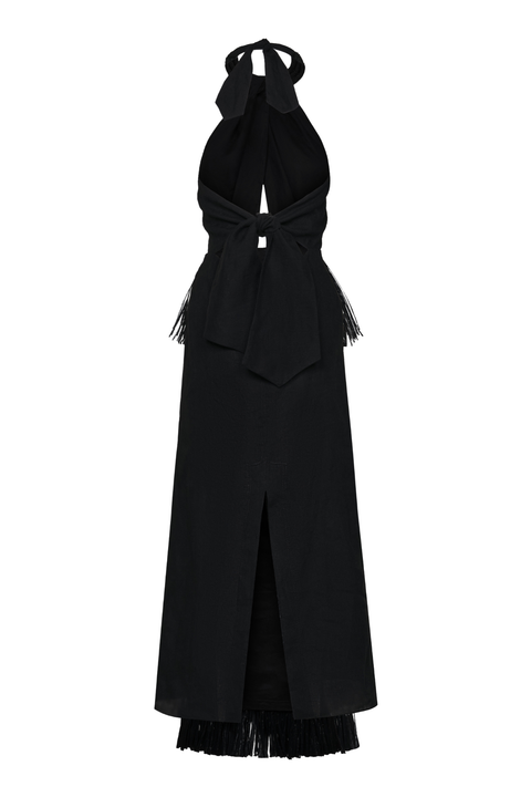 A black long halter neck dress with metallic fringe tiers and an open tie-back
