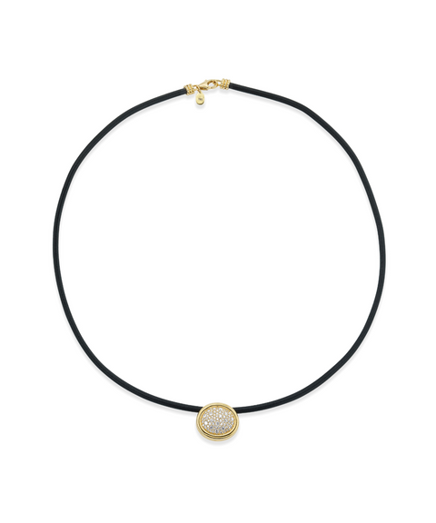 Necklace with a black cord and gold clasp on a white background