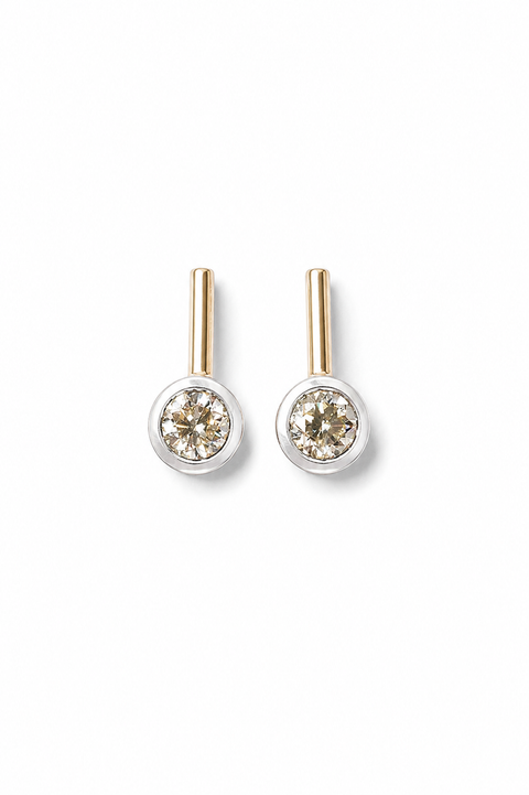Pair of diamond stick stud earrings on a white background