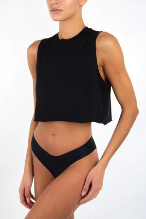 Model wearing the cropped boyfriend tank in black.