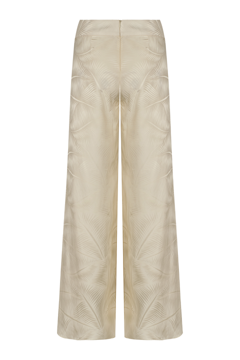 A pair of wide-leg trousers in a  cream color, featuring a subtle tonal geometric pattern on the fabric and a zipper closure