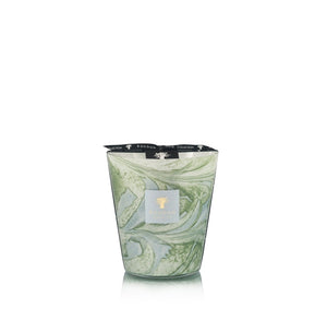 Large glass candle with green and blue marbled designs