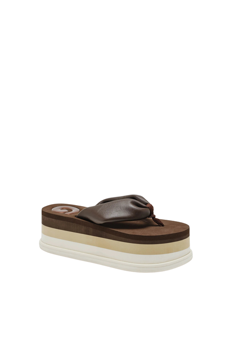 Platform flip-flop sandal with brown, tan, and white color-block close up