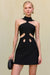 Up close shot of a woman wearing a black mini dress that features a high neck with cutouts in the midriff. 