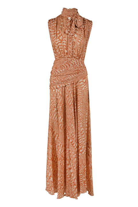 A sleeveless high-neck maxi dress with a tie-neck detail and an abstract orange and brown pattern, shown against a plain white background.