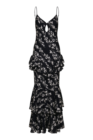 A black maxi-length ruffled dress with a white floral print, spaghetti straps, and a keyhole cutout at the neckline, shown against a plain white background.