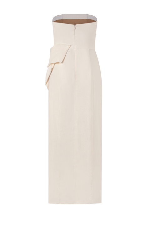 An off-white strapless dress with a structured waist, back zipper, and a draped fabric detail on the right side, shown against a plain white background.