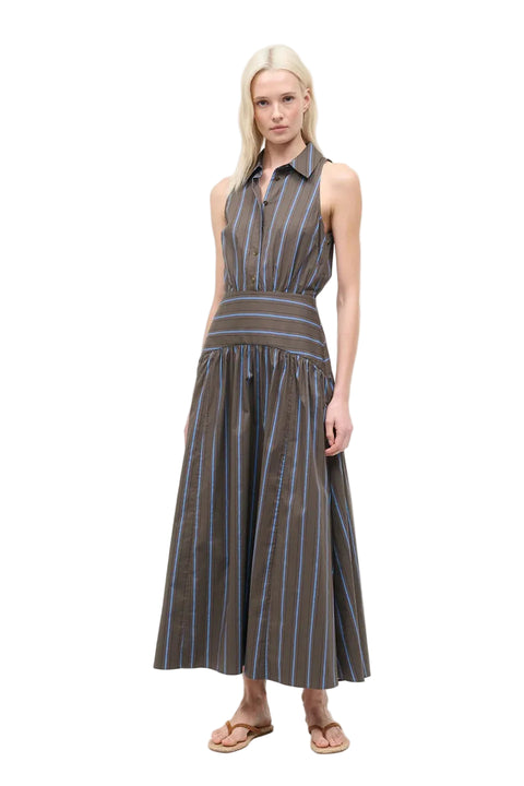 Woman wearing a striped dress on a white background