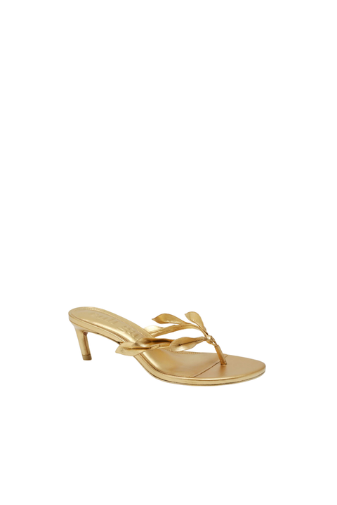 Gold mid heeled thong flip flop sandal with gold leaves side angle