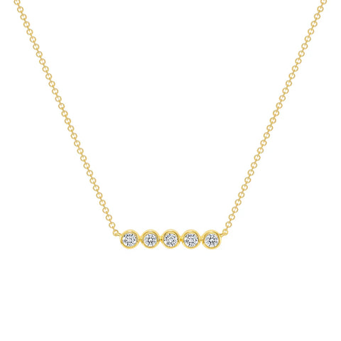 Gold necklace with row of five small diamonds in a row.