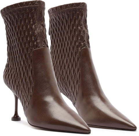 Brown leather ankle boots with textured knit tops on a white background