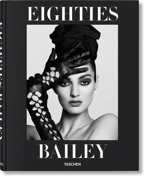 Cover of a black coffee table book titles "Eighties Bailey" with a picture of a woman on the front. 