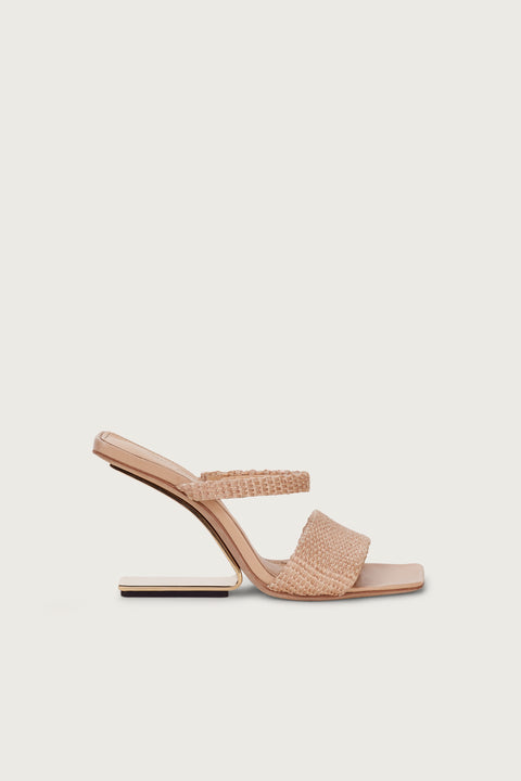 Side profile of a raffia heel that features a gold-toned suspended, geometrical heel and two slide straps.  
