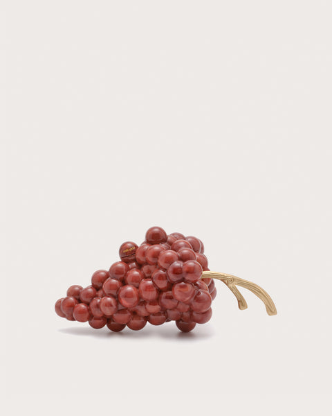 Acrylic artful clutch that resembles a bunch of red grapes with a gold-toned stem. 