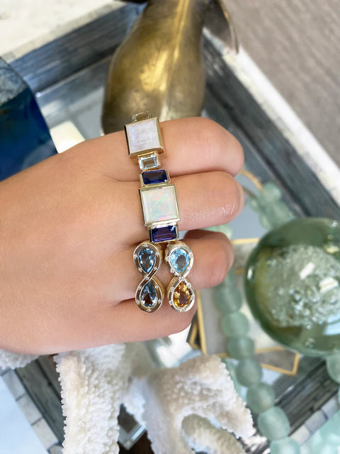 Opal and Tanzanite Trilogy Ring