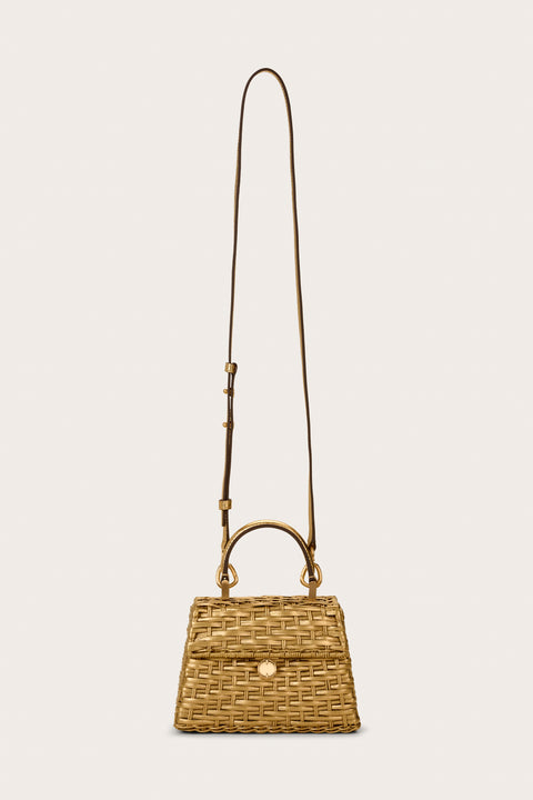A trapezoidal structured woven mini bag that features a gold-toned, metallic finish, with a top handle and gold-toned hardware, and a detachable crossbody strap.