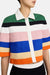 Close up of the multicolor stripe collared top on a model