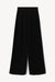 Ghost image of the black wide leg pants on a white background