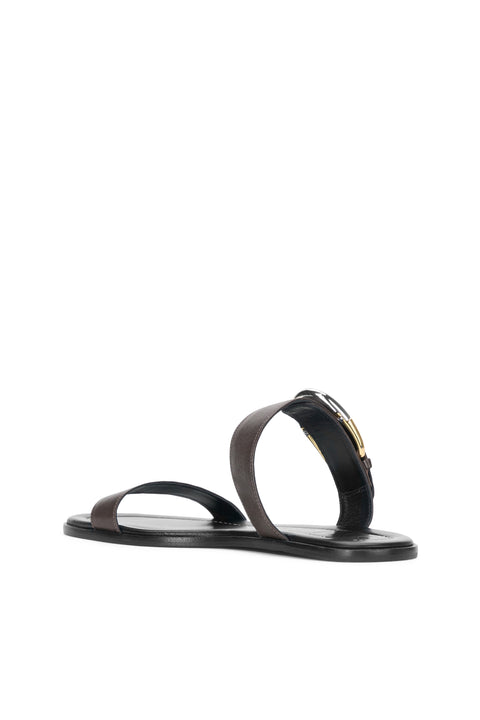 back view of a dark brown, leather, slip-on sandal that features a double strap and moon buckle detail. 