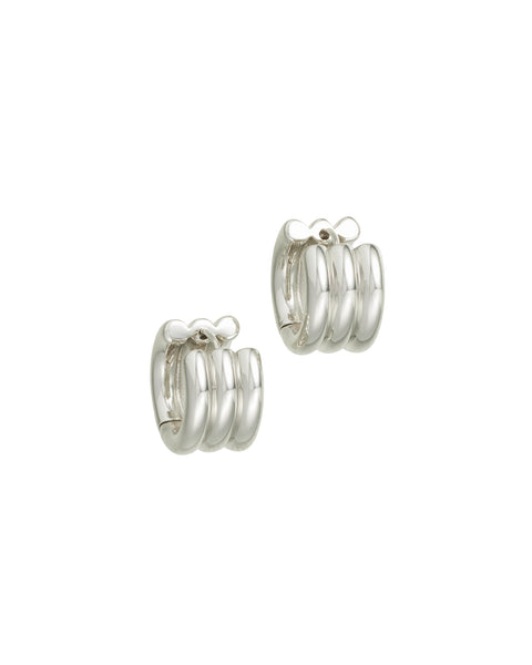 A pair of silver-toned huggie earrings that feature a triple tube design. 