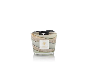 Marbled candle with a white label on a white background