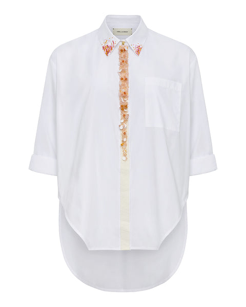 White button down shirt with coral beaded embroidery on the lapel and down the front on a white background.